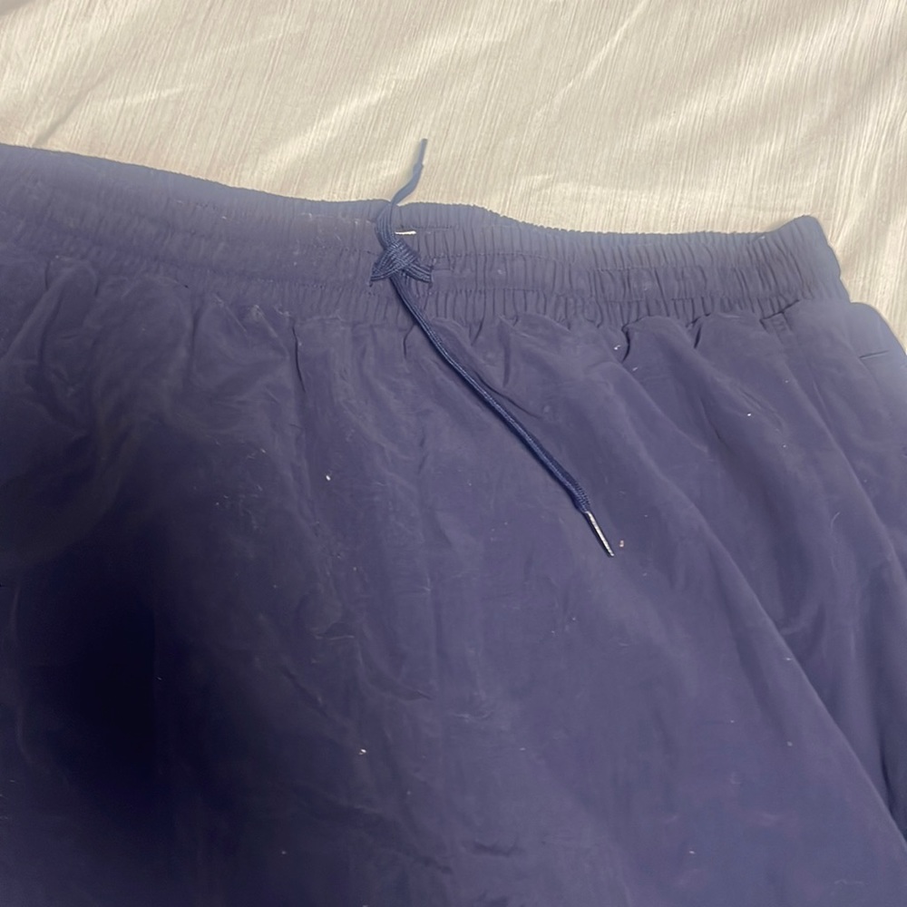 Jogging pants with mesh inside and pockets outside